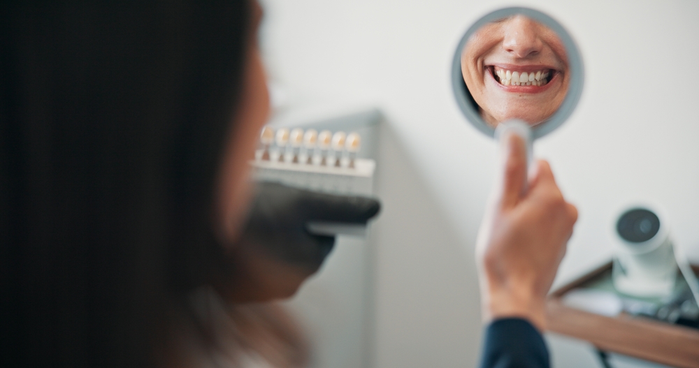 Happy woman, mirror or patient in dental clinic for crown, veneers or medical procedure. 